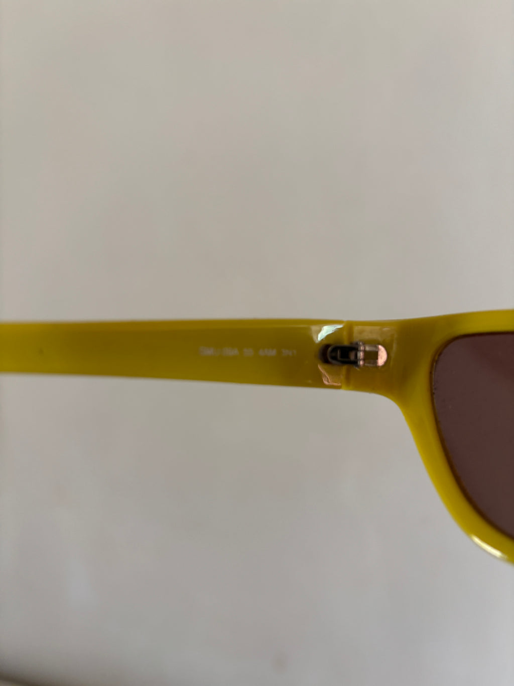 Vintage 2001 Miu Miu yellow cat eyes sunglasses
