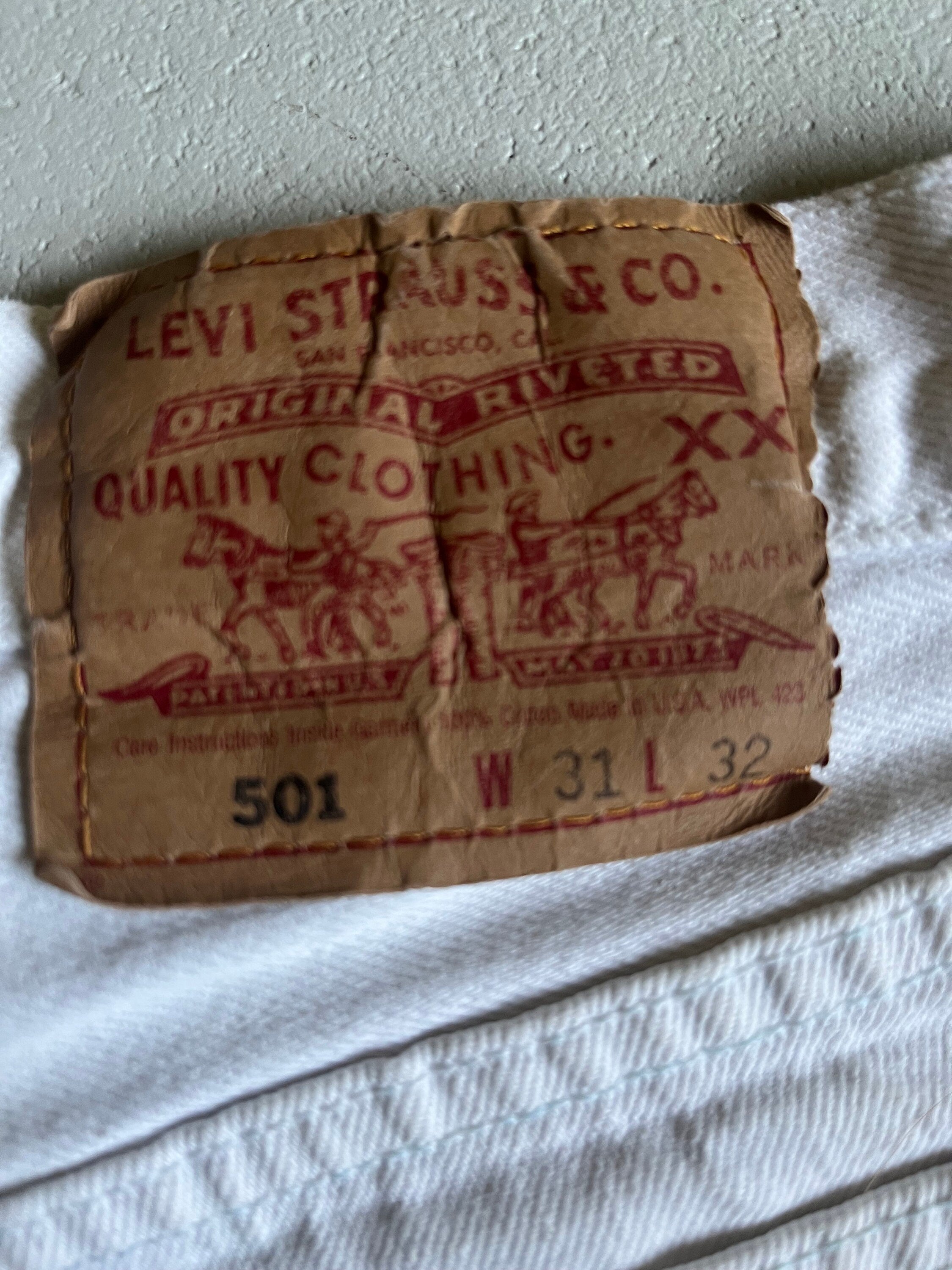 vintage 90s Levi's 501 white denim cut off shorts, made in usa W31